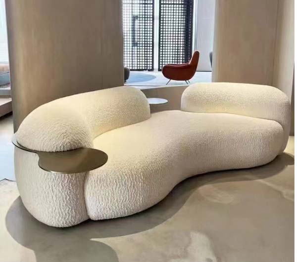 Cream Boucl&eacute; Organic Curved Freeform Sofa with Integrated Bronze Side Table