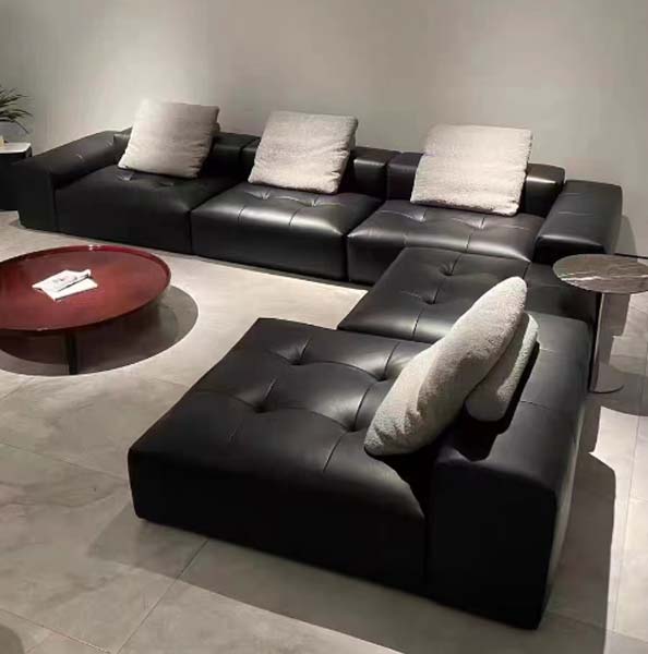 Low-Back Biscuit-Tufted Black Leather Modular L-Sectional Sofa Set with Round Red Lacquer Coffee Table and Stone-Top Metal-Base Side Table