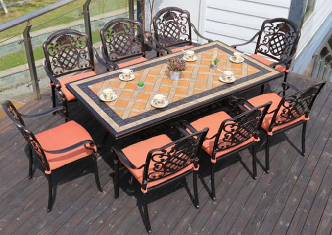 9-Piece Cast Aluminum Outdoor Patio Dining Set with Geometric Tile Tabletop and Orange Cushions