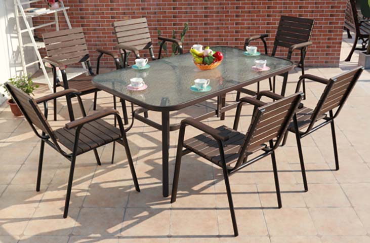 7-Piece Outdoor Patio Dining Set with Tempered Glass Table and 6 Synthetic Wood Slat Armchairs