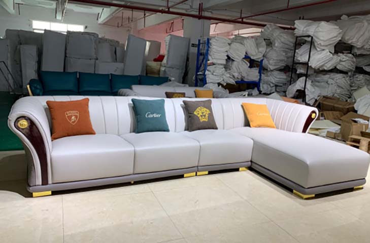 Two-Tone Light Grey Off-White L-Shaped Sectional Sofa with Right Chaise, Channel-Tufted Back, Gold Accents and Dark Wood Trim