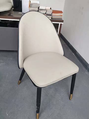 Off-White Upholstered Armless Dining Chair with Black Piping and Brass Foot Caps
