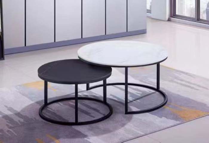Set of 2 Modern Round Nesting Coffee Tables with Black Metal Frames, White and Black Stone-Look Tops