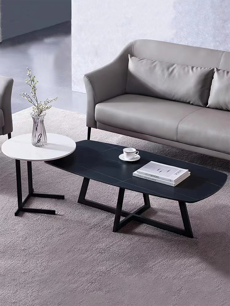 2-Piece Nesting Coffee Table Set with Dark Geometric Oval Top and White Round Top