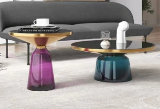 2-Piece Round Nesting Coffee Table Set with Black Tops Gold Trim Colored Glass Pedestal Bases