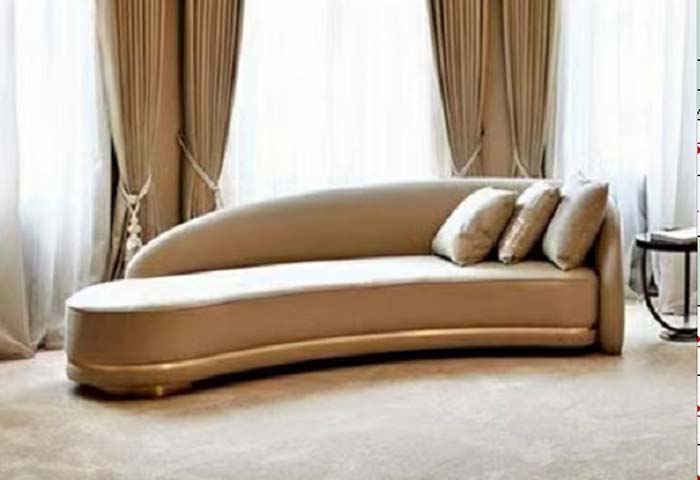 Light Champagne Asymmetric Curved Sofa with Gold Plinth Trim