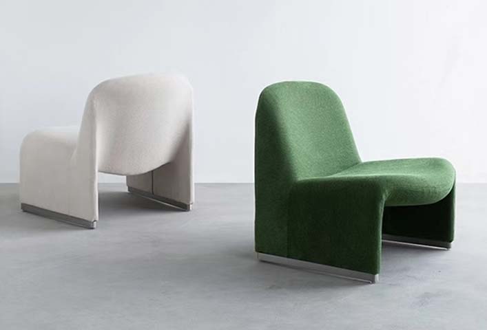 Armless Monolithic Curved Upholstered Lounge Chair with Metal Plinth Base