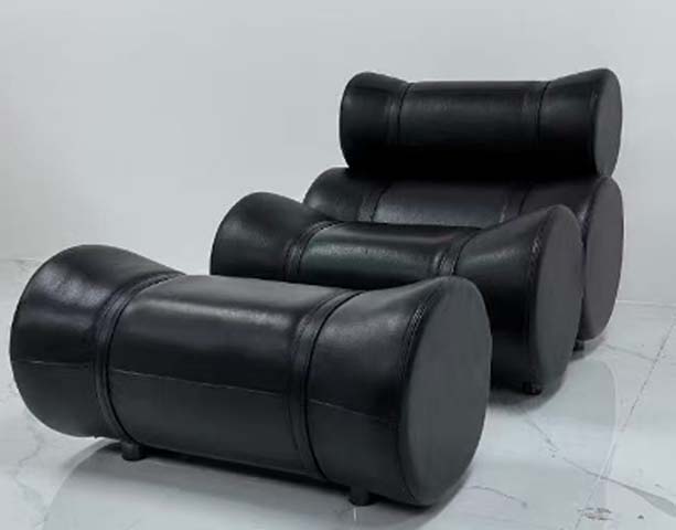 Black Upholstered Stacked Cylindrical Lounge Chair with Matching Ottoman