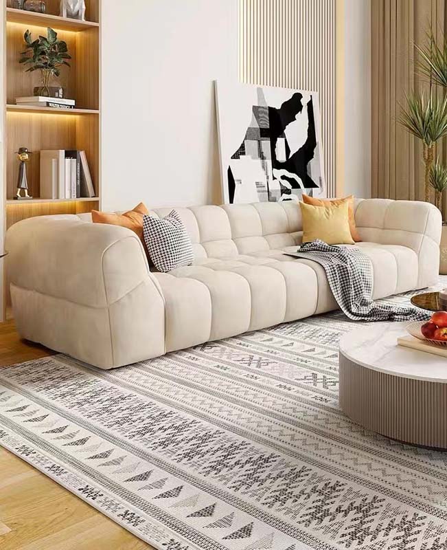 Cream Channel-Quilted Low-Profile Curved 4-Seater Lounge Sofa