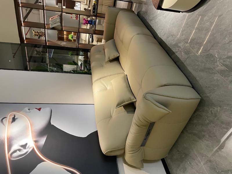 Light Beige Upholstered Three-Seater Sofa with Padded Rounded Arms