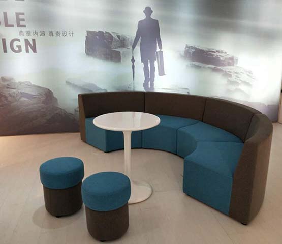 Modular Curved Lounge Seating Set with Round Side Table and Ottomans