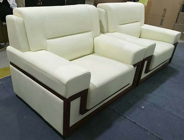 Two-Piece Cream Upholstered Reception Lounge Seating Set with Dark Wood Geometric Trim