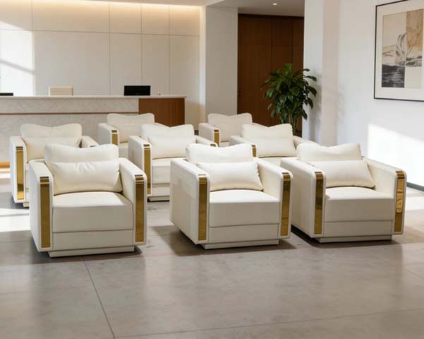White Upholstered Block-Form Single Reception Armchair with Gold-Tone Metal Accents