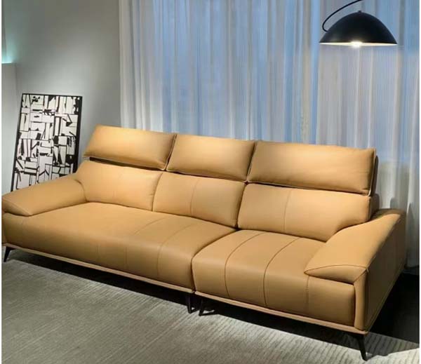 Modern Tan Upholstered Three-Seater Sofa with Adjustable Headrests