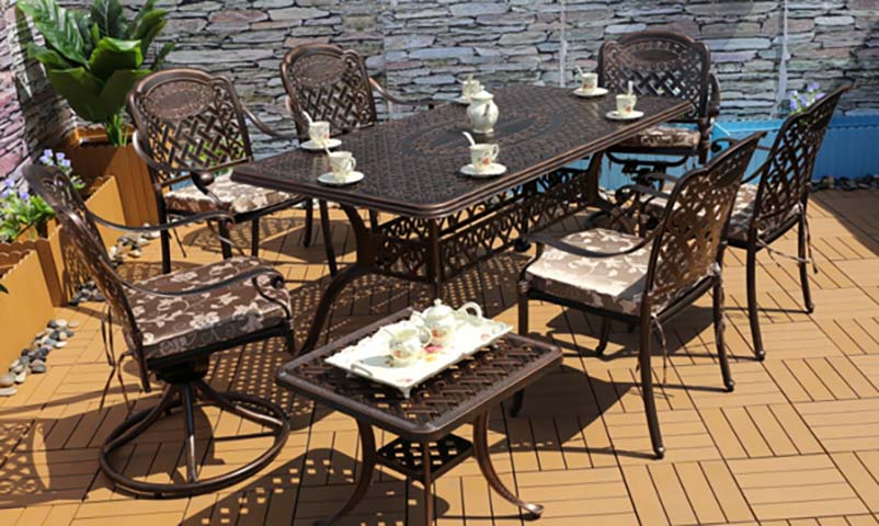 8-Piece Antique Bronze Cast Aluminum Lattice Outdoor Patio Dining Set with Swivel Rockers and Side Table