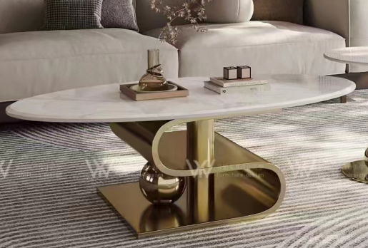Oval White Sintered Stone Coffee Table with Polished Gold Sculptural Metal Base