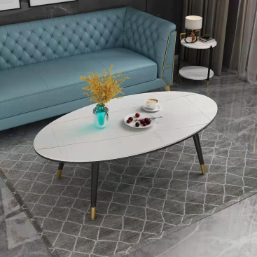 Oval White Top Coffee Table with Black Metal Legs and Gold Accents