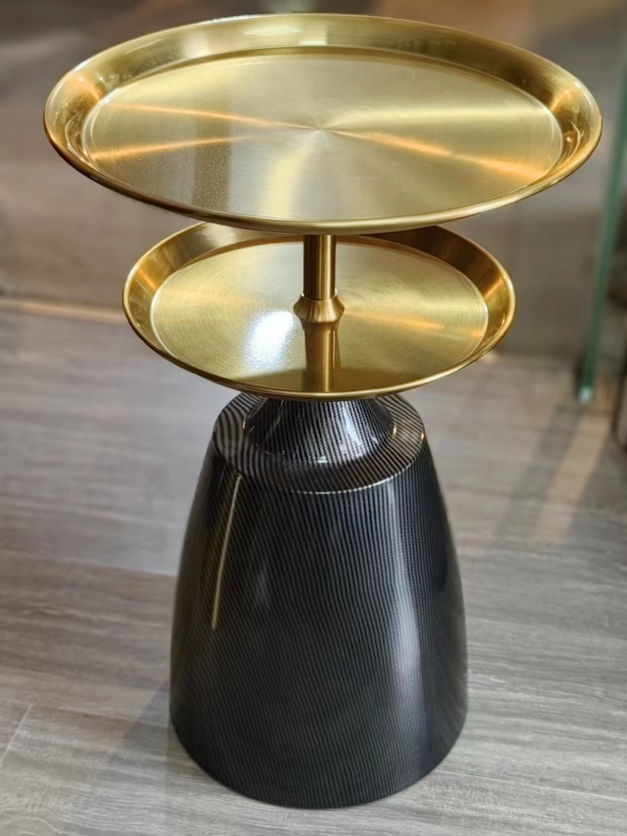 Two-Tier Brushed Gold Tray Side Table with Ribbed Black Conical Pedestal Base
