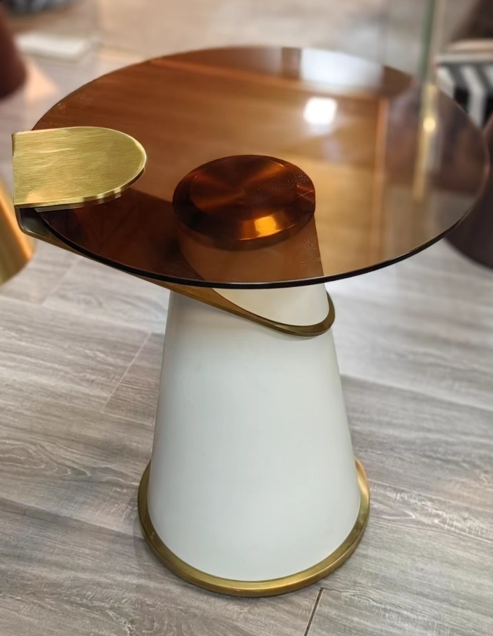 Round Amber Glass Top Side Table with Tapered White Base and Brushed Gold Accents