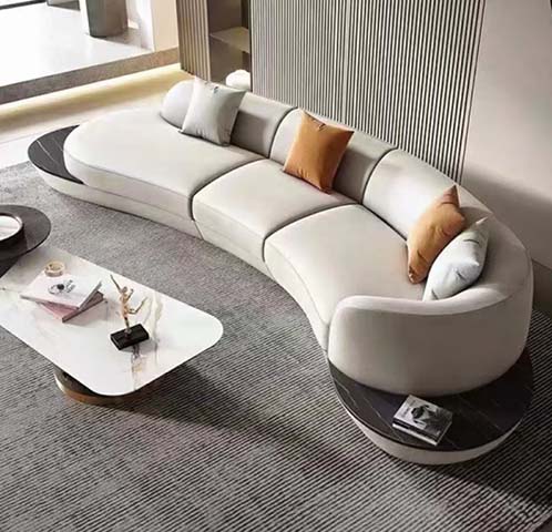 Modern Cream Curved Sectional Sofa with Integrated Black Stone End Shelves