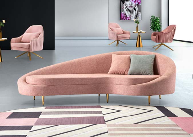 Blush Pink Asymmetrical Curved Lounge Sofa with Gold Tapered Legs