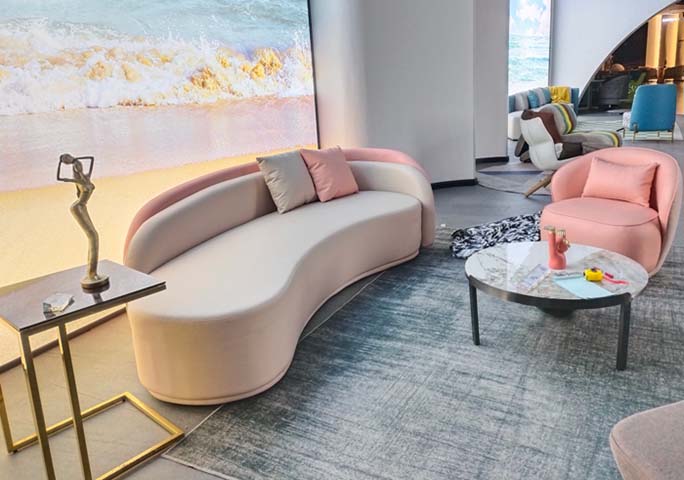 Two-Tone Pink and Off-White Kidney-Shaped Upholstered Curved Sofa