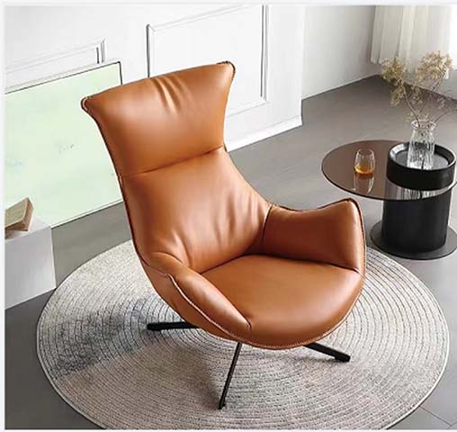 Tan Leather Upholstered Swivel Lounge Armchair with Black Metal Tripod Base