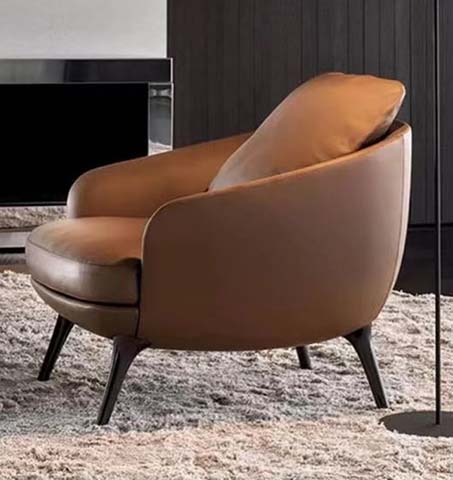 Two-Tone Tan Curved Upholstered Lounge Armchair with Splayed Black Metal Legs