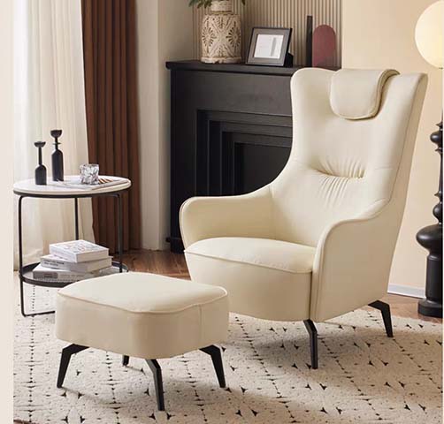 Cream Upholstered Wingback Lounge Chair with Matching Ottoman