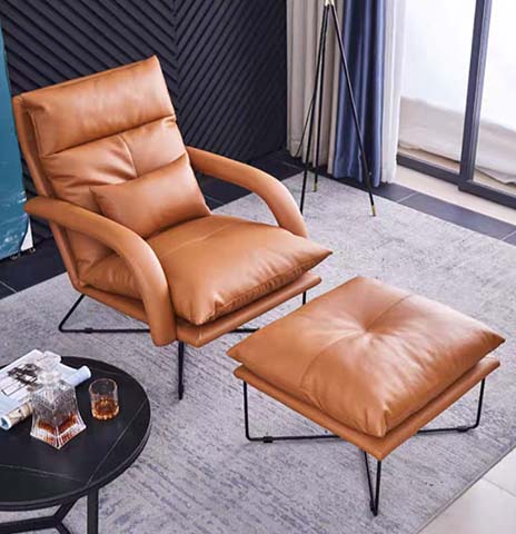 Tan Upholstered Lounge Armchair with Matching Ottoman, Black Metal Sled Base