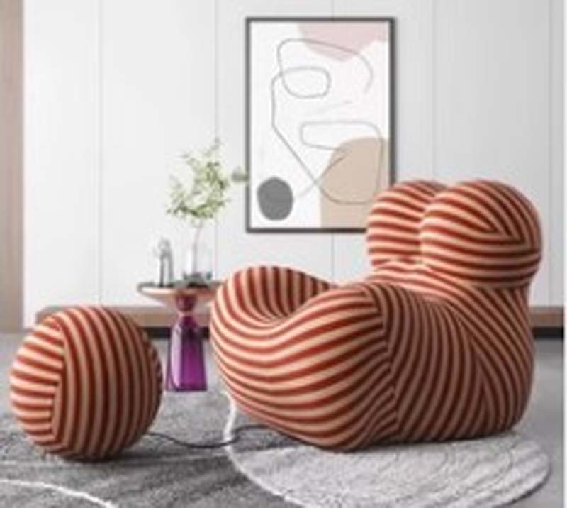 Ribbed Upholstered Lounge Chair with Matching Ottoman