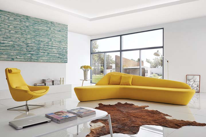 Bright Yellow Asymmetrical Curved Armless Plinth Base Sectional Sofa