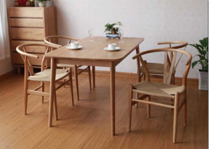 Four-Person Solid Wood Dining Table with Wishbone Dining Chairs
