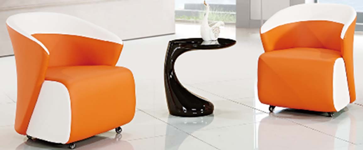 Two Orange and White Upholstered Lounge Armchairs with Black C-Shaped Side Table