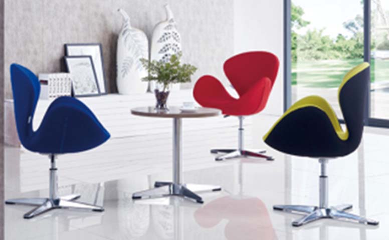 Upholstered Swivel Lounge Chair with Polished Four-Star Base