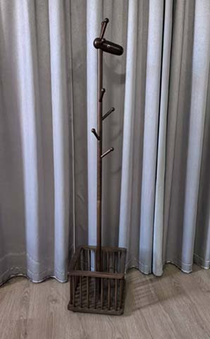 Freestanding Coat Rack with Slatted Storage Basket and Eight Hooks