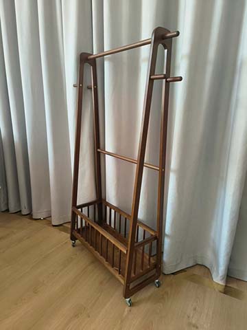 Mobile Walnut-Finish Garment Rack with Lower Slatted Storage Basket