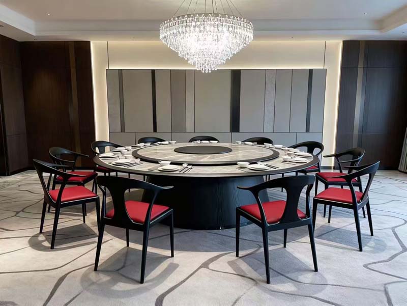 12-Seat Round Banquet Dining Table with Red Upholstered Black-Framed Chairs